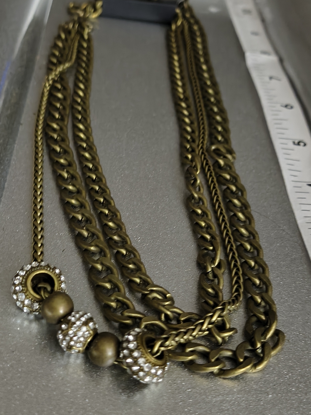 Paparazzi  Antique Gold Brass Multi-Strand Rhinestone Accent Necklace